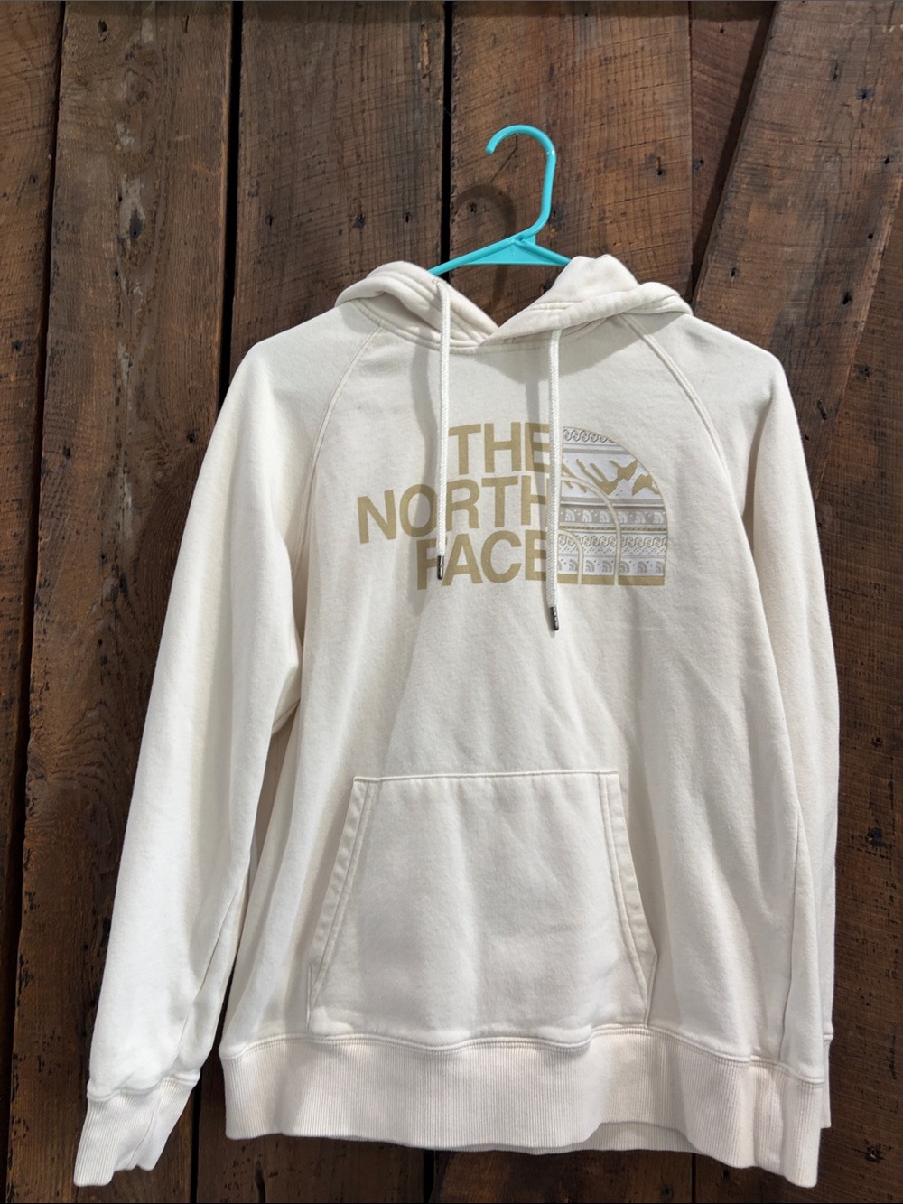 The North Face Women’s Cream Pullover Hoodie with Gold Logo